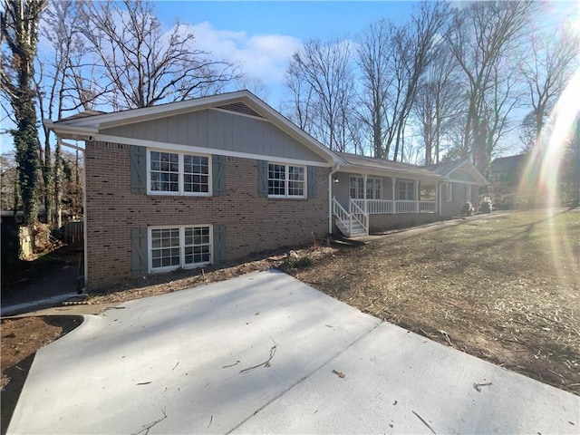 back of house with a porch