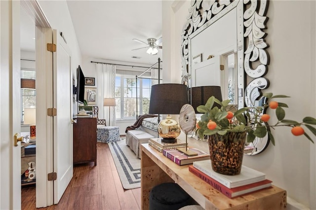 interior space with a ceiling fan