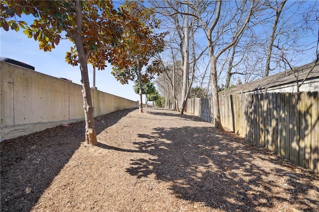 view of yard featuring a fenced backyard