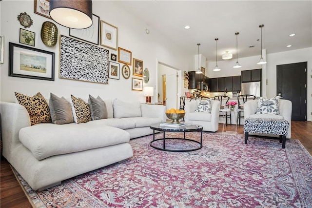 living room featuring dark wood-style floors and recessed lighting