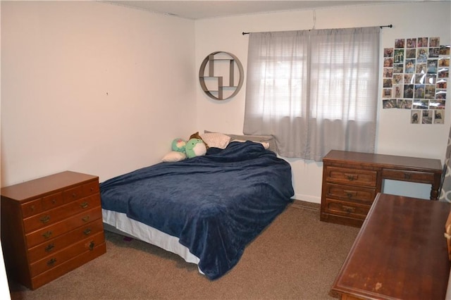 bedroom featuring light carpet