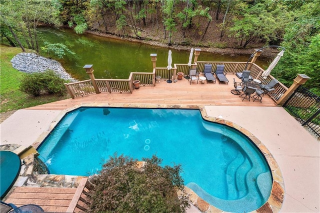 outdoor pool featuring a wooden deck