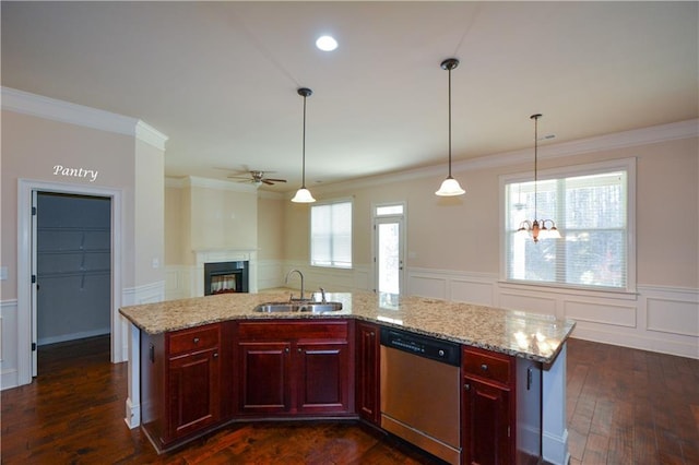 kitchen featuring a center island with sink, stainless steel dishwasher, dark hardwood / wood-style floors, and sink