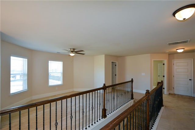 corridor featuring carpet