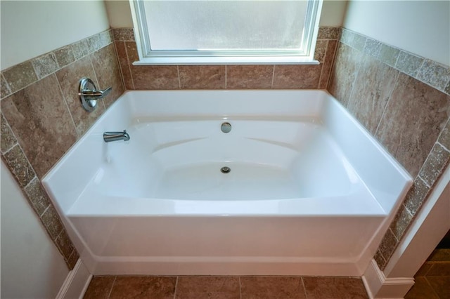 bathroom with a washtub