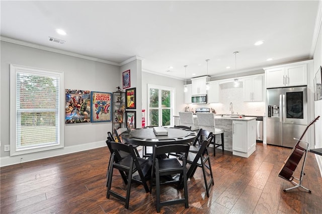 3423 Jamont Blvd, Alpharetta, GA 30022 - dining room featuring recessed lighting, ornamental molding, dark wood finished floors, and baseboards