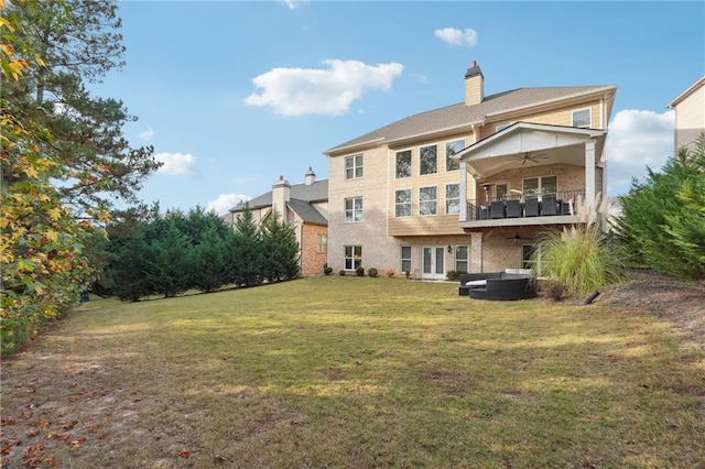 3423 Jamont Blvd, Alpharetta, GA 30022 - rear view of house featuring ceiling fan, a balcony, a yard, a jacuzzi, and a chimney