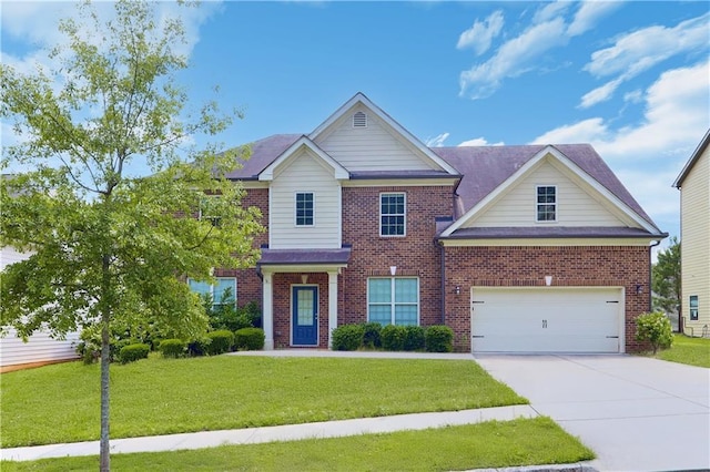 1433 Sand Way, Lawrenceville, GA 30045 - view of front of home featuring driveway, a front lawn, and brick siding
