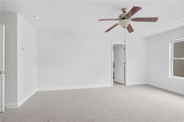 1433 Sand Way, Lawrenceville, GA 30045 - unfurnished room featuring light carpet, ceiling fan, baseboards, and a smoke detector