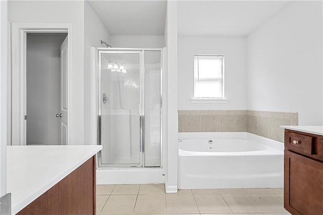 1433 Sand Way, Lawrenceville, GA 30045 - bathroom featuring vanity, tile patterned flooring, a shower stall, and a garden tub