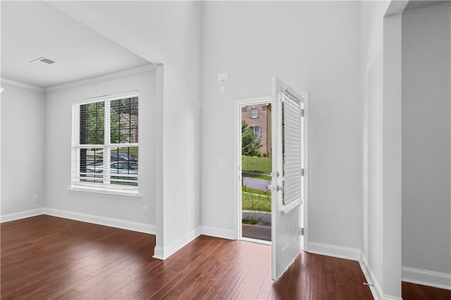 1433 Sand Way, Lawrenceville, GA 30045 - entryway with wood finished floors, ornamental molding, and baseboards