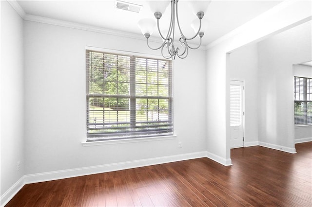 1433 Sand Way, Lawrenceville, GA 30045 - spare room with a chandelier, ornamental molding, hardwood / wood-style flooring, and baseboards