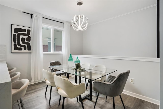 dining room featuring dark hardwood / wood-style flooring and a chandelier