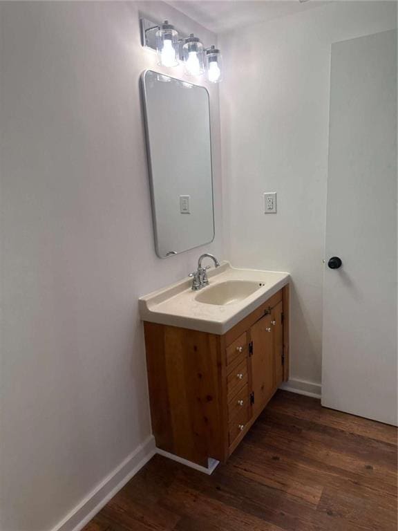 68 Star Lake Ln, Sautee Nacoochee, GA 30571 - bathroom featuring wood finished floors, vanity, and baseboards