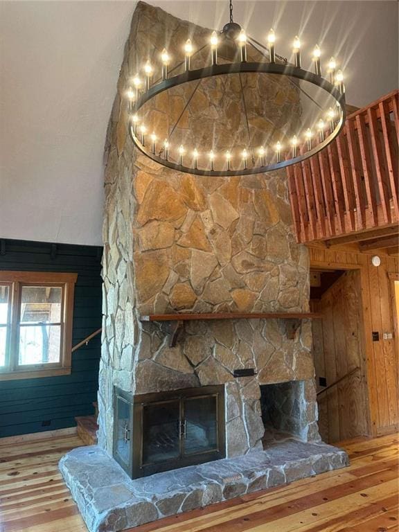 68 Star Lake Ln, Sautee Nacoochee, GA 30571 - detailed view of wood finished floors, a stone fireplace, and wooden walls