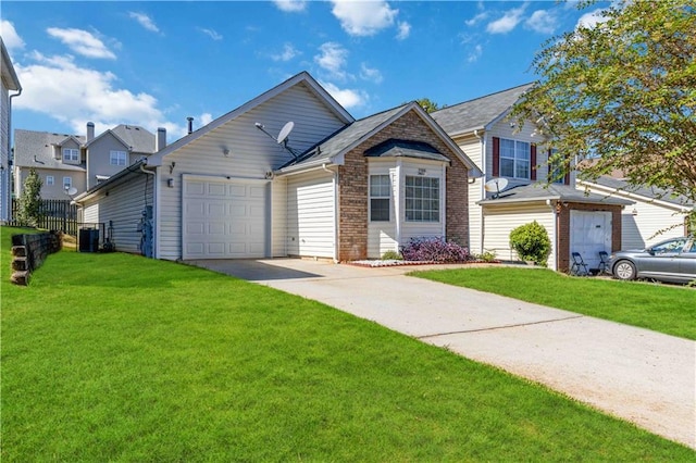 view of property with a garage, a front lawn, and central air condition unit