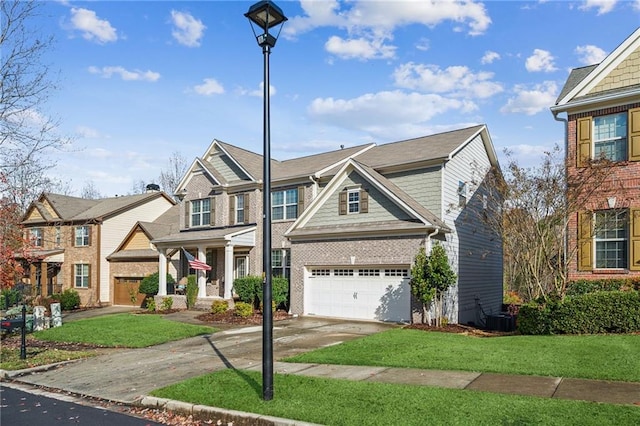 view of front of house featuring a garage and a front lawn