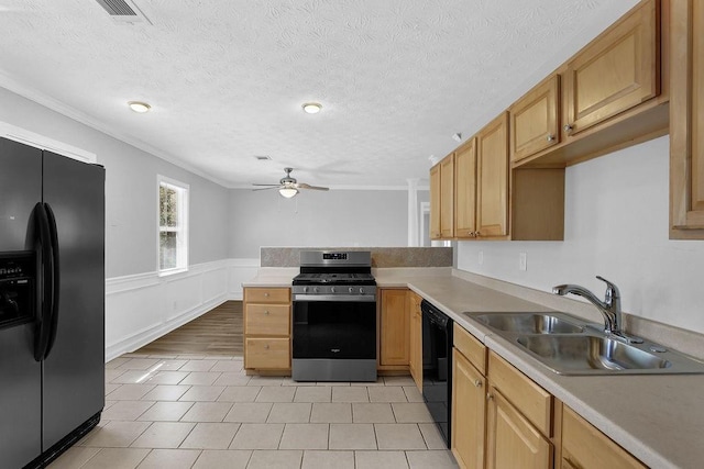 3618 Mansfield Ln, Snellville, GA 30039 - kitchen with light countertops, a ceiling fan, a sink, and black appliances