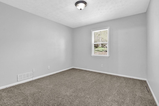 3618 Mansfield Ln, Snellville, GA 30039 - empty room featuring baseboards, a textured ceiling, visible vents, and carpet