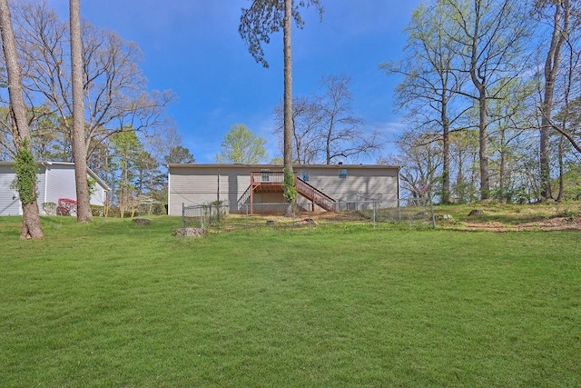 3618 Mansfield Ln, Snellville, GA 30039 - view of yard featuring fence, stairway, and a deck