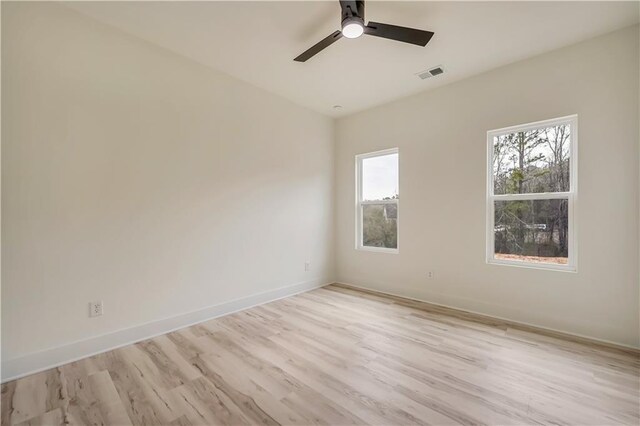 4265 Haynes Cir, Snellville, GA 30039 - unfurnished bedroom featuring ceiling fan and light hardwood / wood-style floors