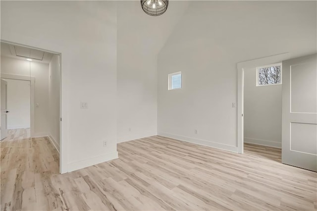4265 Haynes Cir, Snellville, GA 30039 - empty room with a towering ceiling and light wood-type flooring