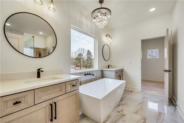 4265 Haynes Cir, Snellville, GA 30039 - bathroom featuring vanity and a tub