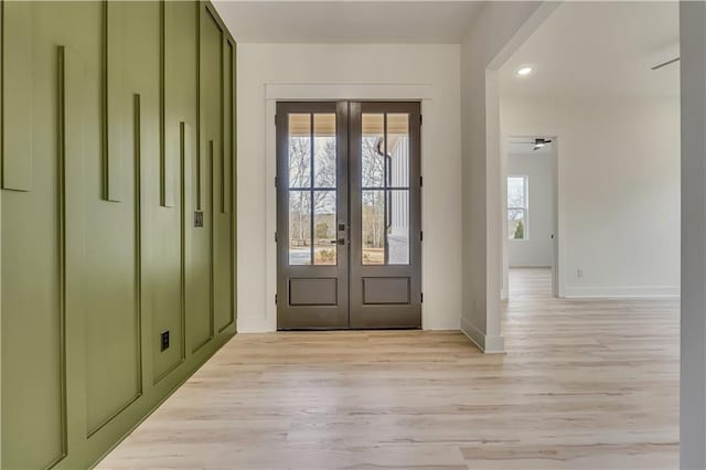 4265 Haynes Cir, Snellville, GA 30039 - doorway featuring light hardwood / wood-style floors and french doors