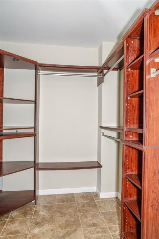 walk in closet featuring tile patterned floors