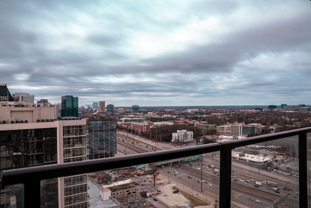 balcony featuring a city view