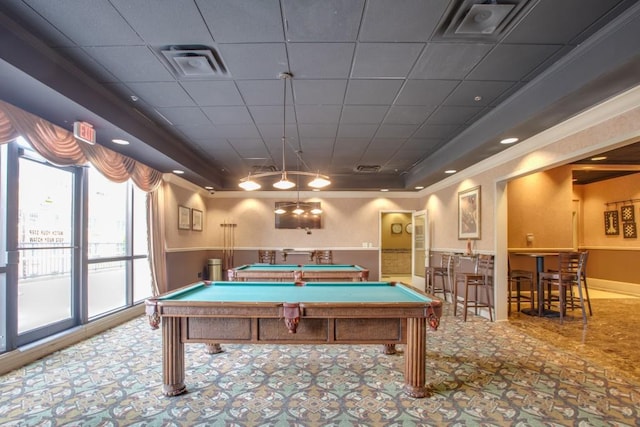 rec room with a tray ceiling, billiards, visible vents, and crown molding