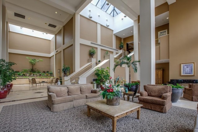 building lobby featuring visible vents and stairway