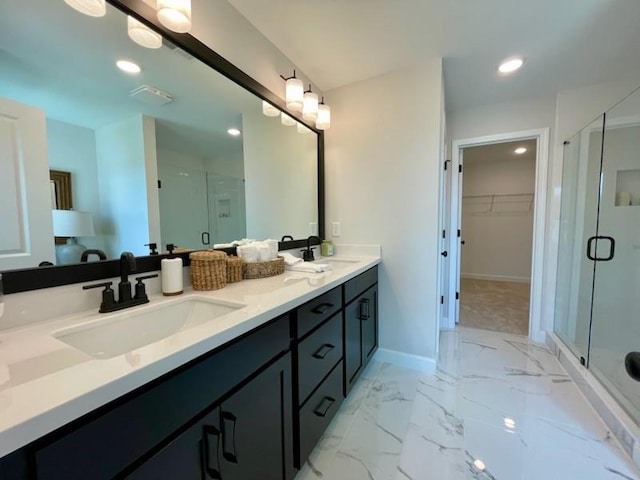 120 Winsome Way, Woodstock, GA 30188 - full bath with a shower stall, double vanity, marble look tiles, a walk in closet, and recessed lighting