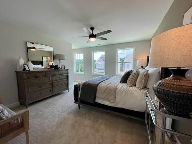 120 Winsome Way, Woodstock, GA 30188 - bedroom with multiple windows, a ceiling fan, and light carpet