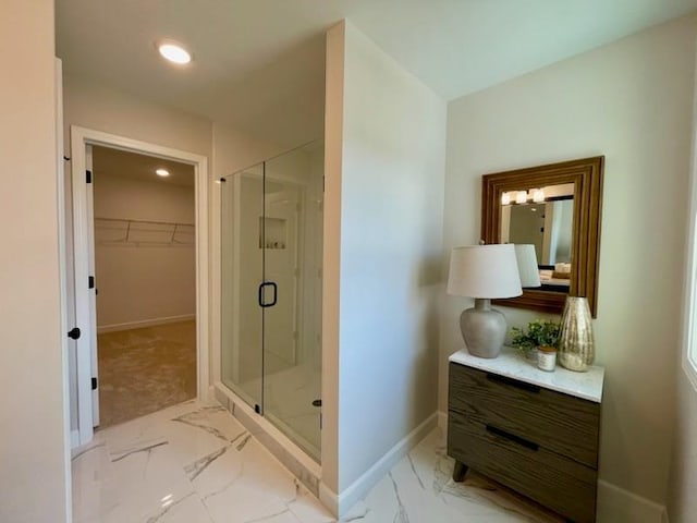 120 Winsome Way, Woodstock, GA 30188 - bathroom with marble look tiles, a stall shower, a walk in closet, and recessed lighting