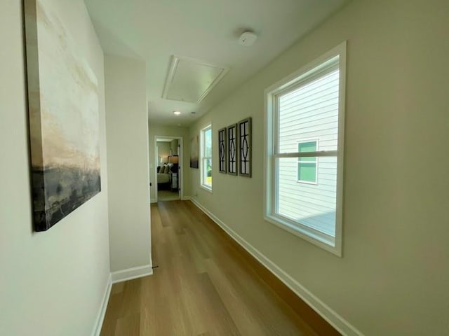 120 Winsome Way, Woodstock, GA 30188 - corridor featuring attic access and wood finished floors