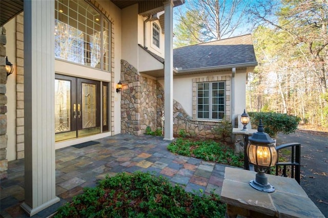 property entrance featuring french doors