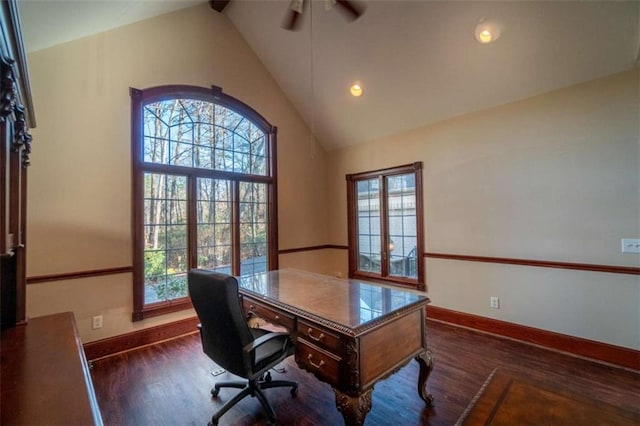 office space with dark hardwood / wood-style floors, ceiling fan, and high vaulted ceiling