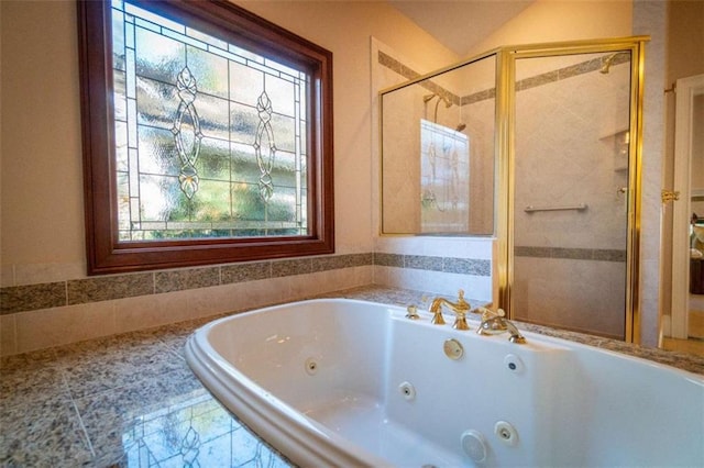 bathroom with plenty of natural light, plus walk in shower, and vaulted ceiling