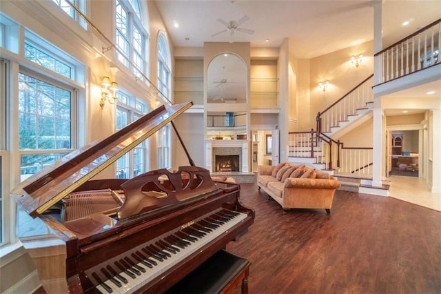 misc room featuring a wealth of natural light and a high ceiling