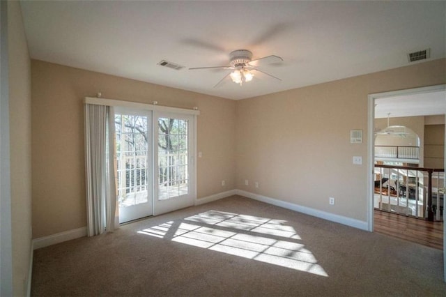 unfurnished room featuring carpet flooring and ceiling fan