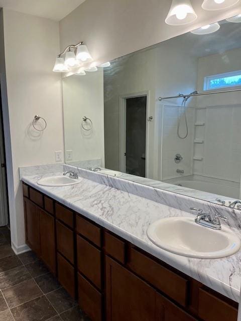 bathroom featuring vanity and shower / bath combination