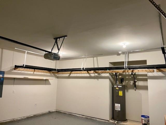 basement featuring electric water heater