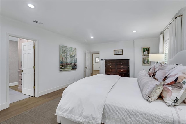 2562 Red Valley Rd, Atlanta, GA 30305 - bedroom with wood finished floors, baseboards, visible vents, and recessed lighting