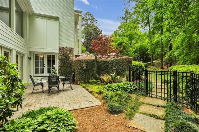 2562 Red Valley Rd, Atlanta, GA 30305 - view of yard with french doors, fence, and a patio
