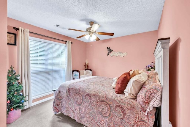 835 Custom Ln, Winder, GA 30680 - carpeted bedroom featuring a textured ceiling, ceiling fan, and baseboards