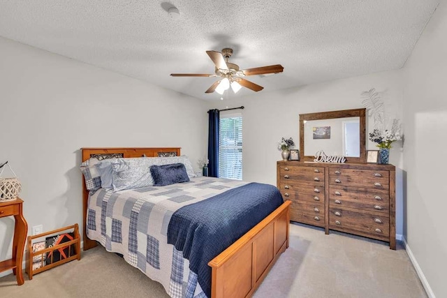 835 Custom Ln, Winder, GA 30680 - bedroom with light carpet, a textured ceiling, a ceiling fan, and baseboards