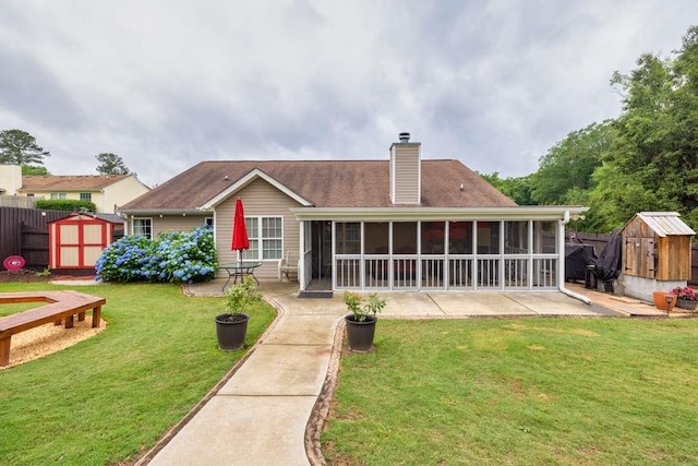 835 Custom Ln, Winder, GA 30680 - back of property featuring a patio area, a sunroom, and a chimney