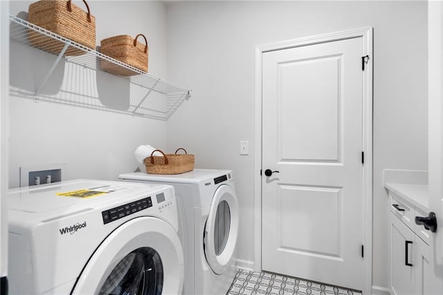 laundry room featuring light tile patterned flooring and independent washer and dryer