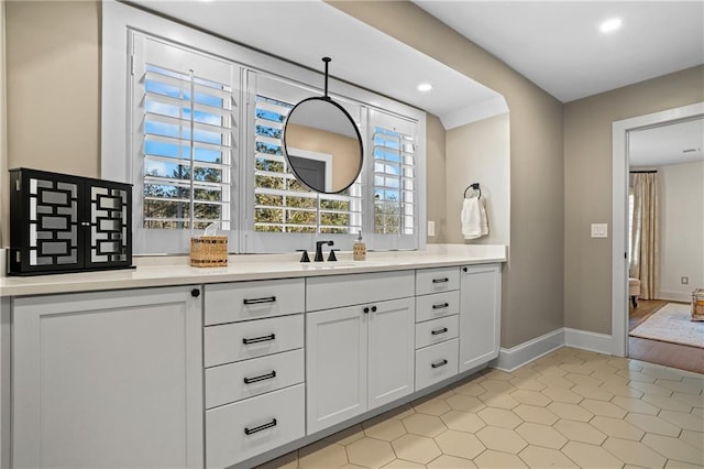 bathroom with vanity and tile patterned floors